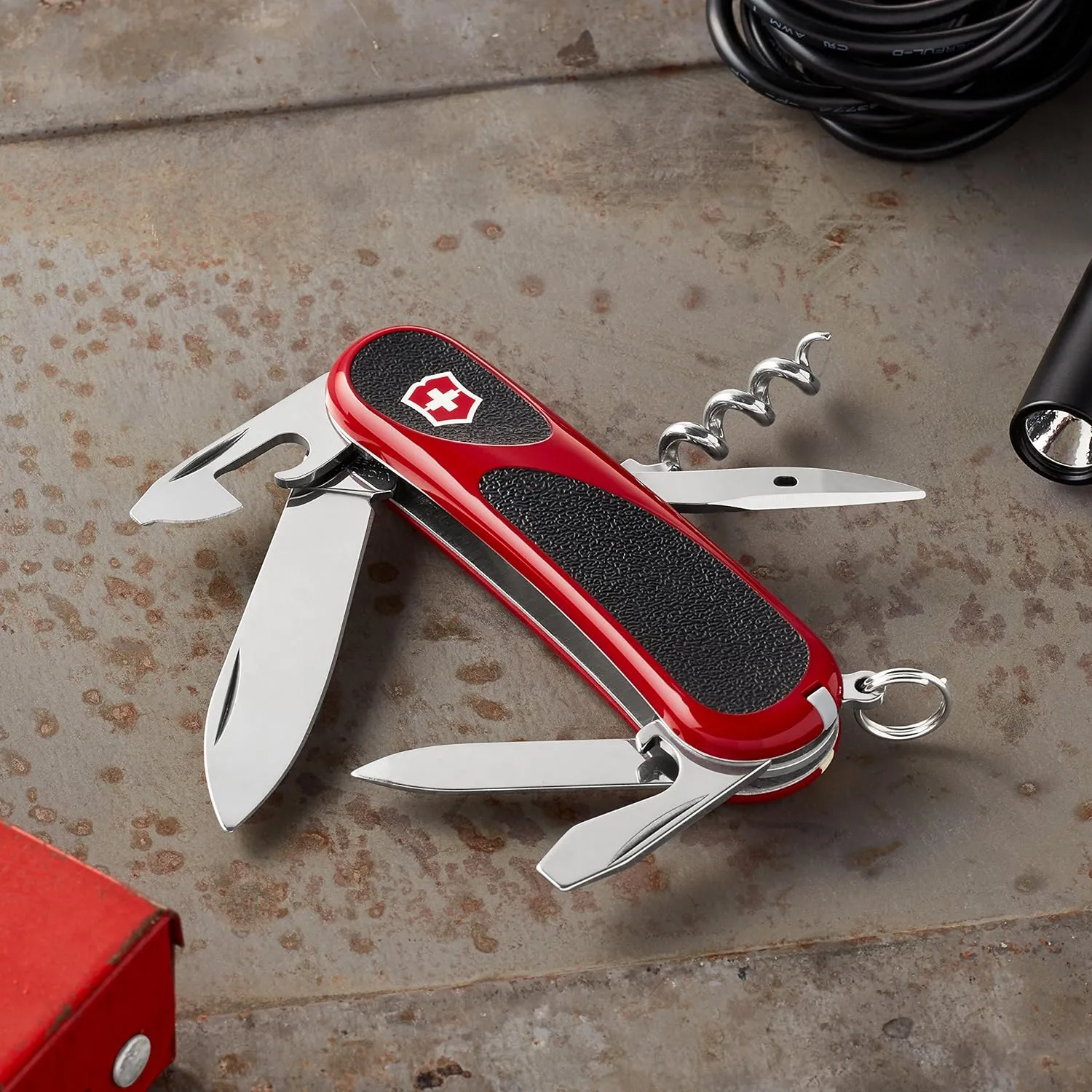 Victorinox Evolution 10 Grip Swiss Army Knife, 13 Function Ergonomic Swiss Made Pocket Knife with Large Blade, Reamer and Nail File - Red/Black