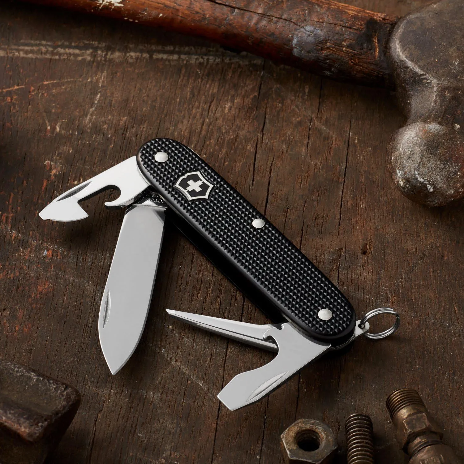 Victorinox Pioneer Alox Swiss Army Knife, 8 Functions, Swiss Made Pocket Knife with Reamer, Key Ring, Can Opener and Large Blade - Black